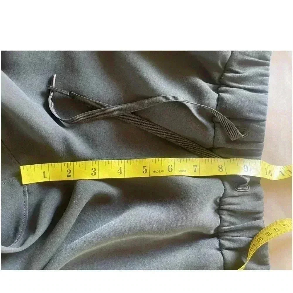 Lululemon On The Fly Pant 28" Olive
Size 2 - Picture 12 of 12